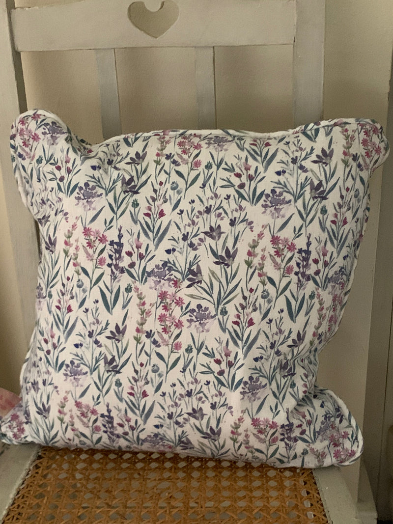 Pretty handmade piped cushion in Amoris Lavande by Swaffer