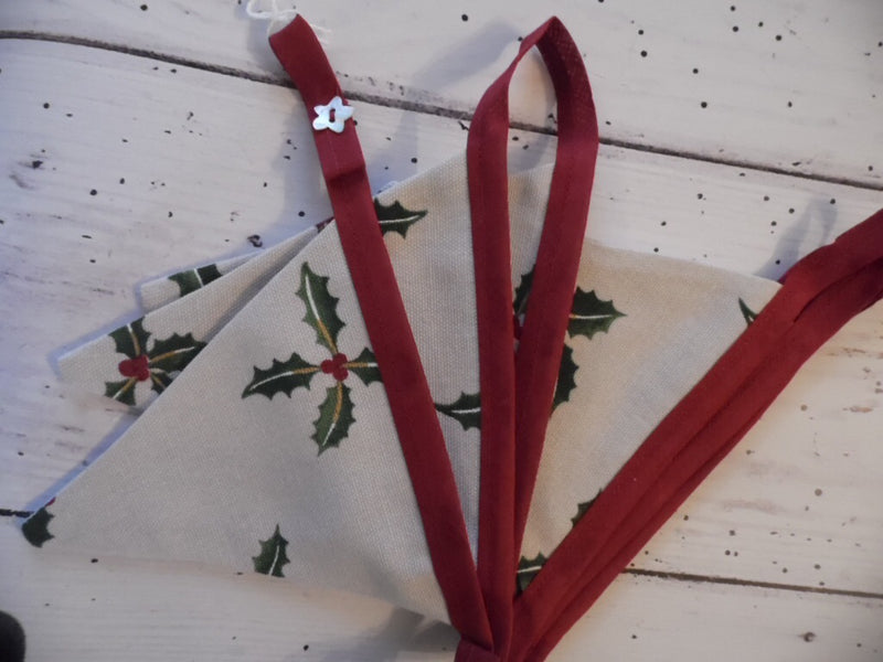 Handmade Christmas bunting in Sophie Allport 'Holly'