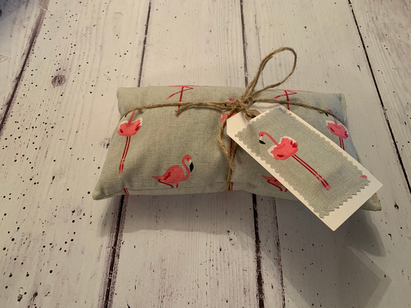 Wheat and Lemon Balm Heat pack. In Sophie Allport Flamingo