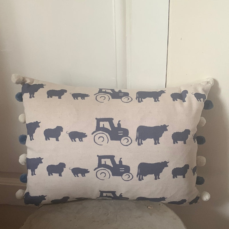 Fabulous oblong cushion in Farm fabric by Norford Designs with navy Pom poms