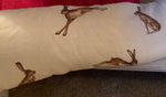 Handmade draught excluder, on Peony and Sage French Hare