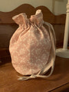 Handmade drawstring wash bag in Peony and Sage Isla  with waterproof lining