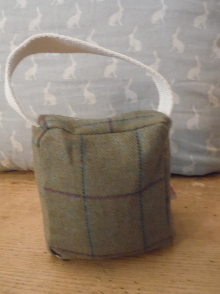 Handmade small door stop in the a lovely Tweed fabric by Abraham Moon