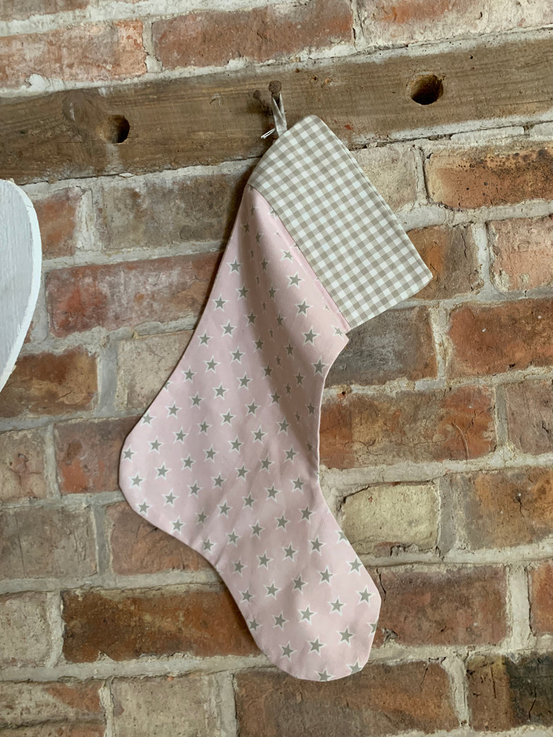 Pink and beige star Christmas stocking . With gingham top