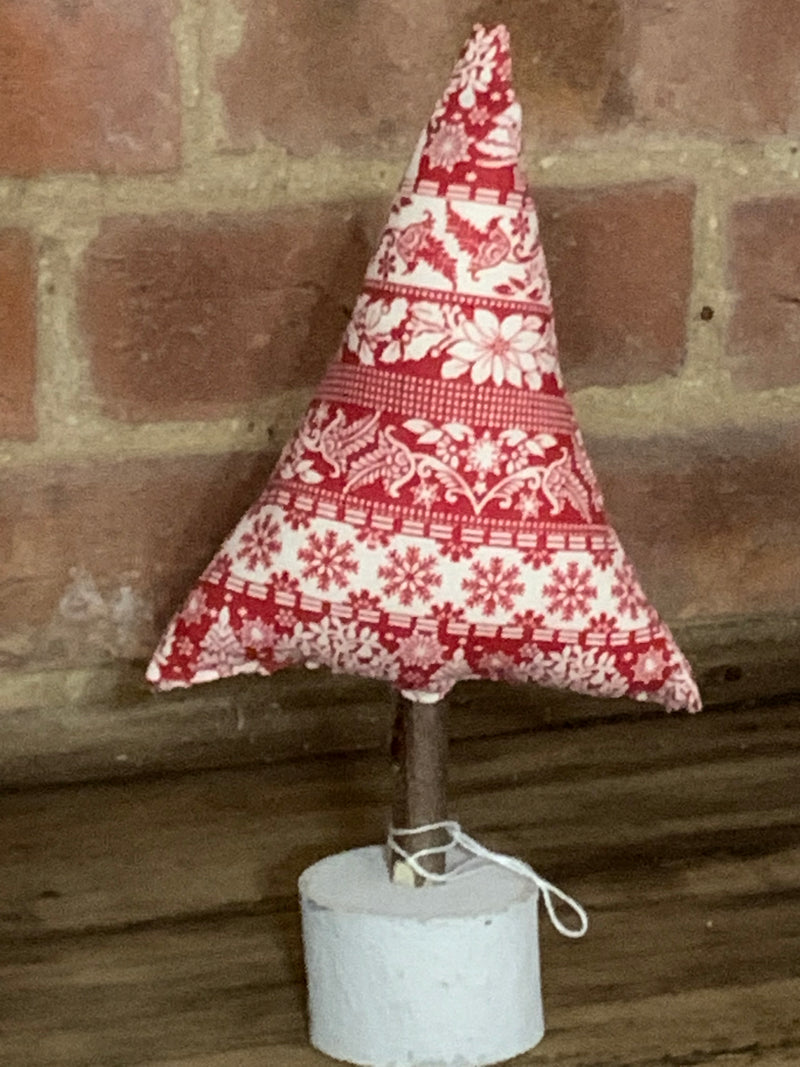 Handmade Christmas tree on a rustic base in pretty’s Scandinavian style fabric
